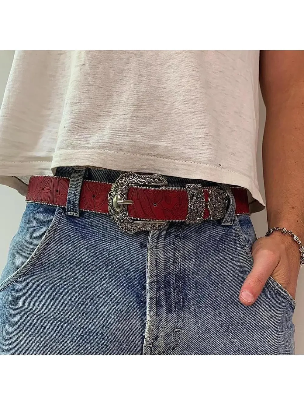 Red Western Floral belt with silver belt buckle. 38 inches length